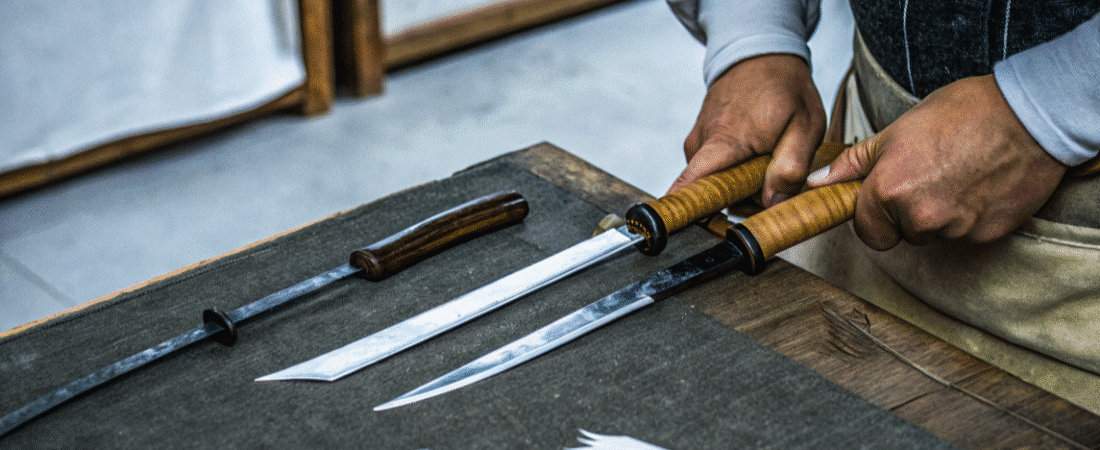 Kogatana - Japanes Knives Tips A closeup of a man working on a Kogatana knive.