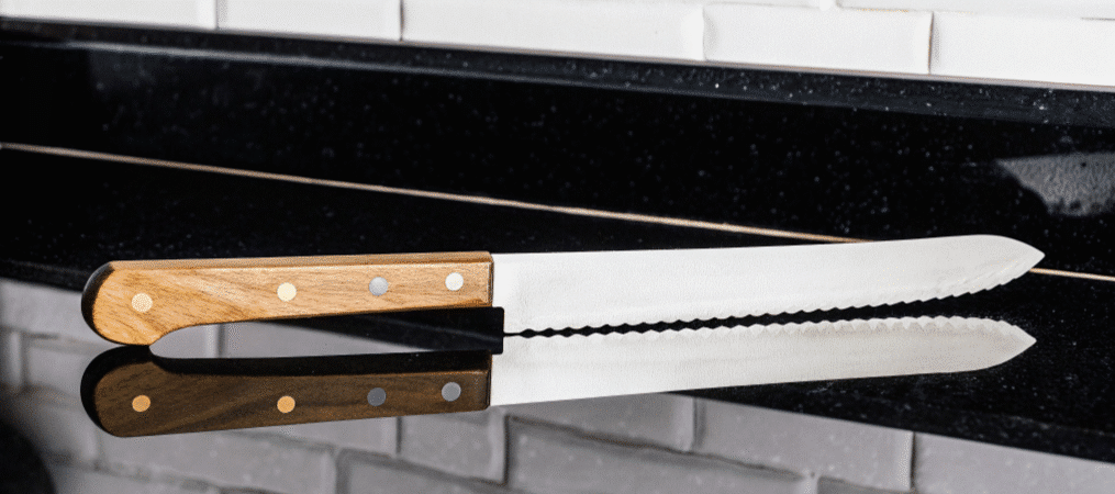 A photograph of a Serrated Knife in a kitchen.