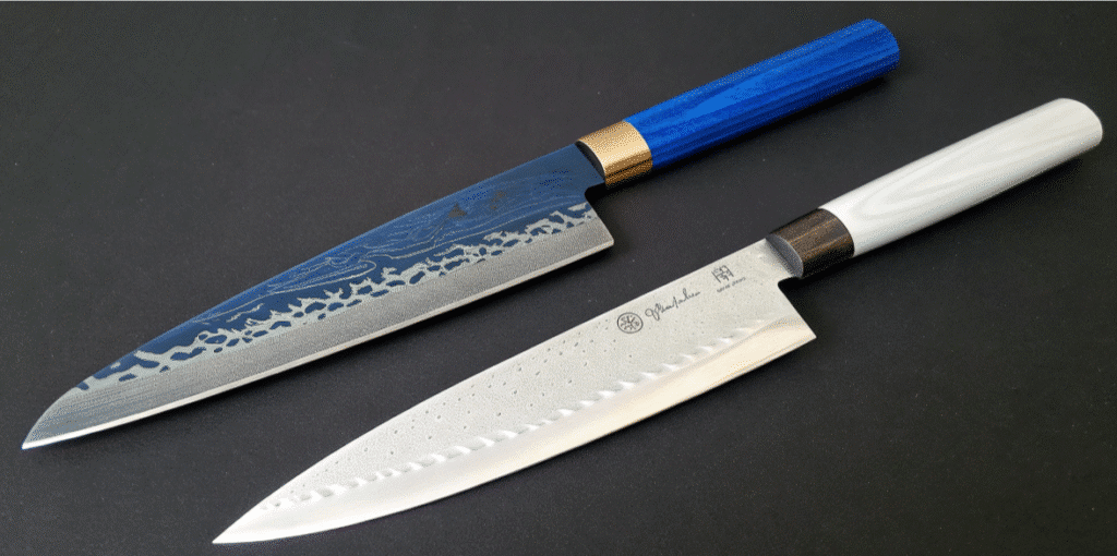 What Are Blue Steel and White Steel - Japanes Knives Tips The image depicts two types of high carbon steel knives, blue steel and white steel, showcasing their distinct characteristics. The blue steel knife, known for its excellent edge retention and durability, contrasts with the white steel knife, which offers a sharper edge but may require more frequent sharpening, both representing the craftsmanship of Hitachi Metals in Japan.