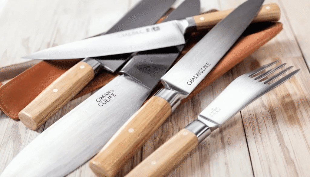 image - Japanes Knives Tips The image features an elegant knife set, showcasing a variety of kitchen knives including a chef's knife, paring knife, and fillet knife, all crafted with high-quality stainless steel for durability and sharpness. Each knife has a comfortable D-shaped handle, emphasizing the craftsmanship and precision that professional chefs appreciate for their cooking experience.