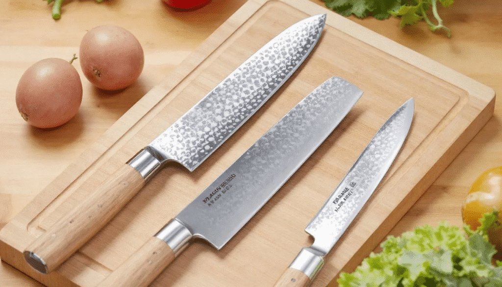 image - Japanes Knives Tips The image showcases a collection of traditional Japanese knives, including a santoku and gyuto knife, highlighting their exquisite craftsmanship and razor-sharp edges. Each knife features a beautifully hammered blade, emphasizing the durability and precision that make these Japanese kitchen knives a favorite among professional chefs and home cooks alike.